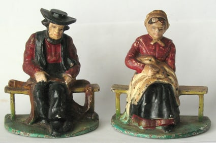 Vintage pair of cast iron Amish couple bookends.