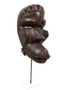 Mask – Wood – Guere – Ivory Coast: Stunning Guere mask with great eye for detail from Ivory Coast. The Guere, neighbors of the Dan, make masks for similar purposes but usually of a form that is more &#8220;scary&#8220; than Dan masks.