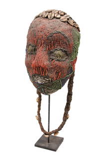 Beaded Mask – Beads, Wood – Bamileke – Grassland of Cameroon: Old wooden beaded mask from the BAMUN tribe of the Grasland of Cameroon. This types of wooden masks were worn on top of the head. The face is colourfull inlayed with beads of multiple colors. Good con
