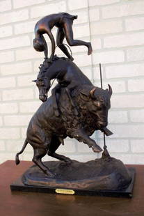 Vintage Frederic Remington Buffalo Horse Sculpture: Vintage from before 2000Materials: Art medium: Bronze, Marble, MetalDepth: 8 inchesHeight: 24 inchesWidth: 17 inchesVintage