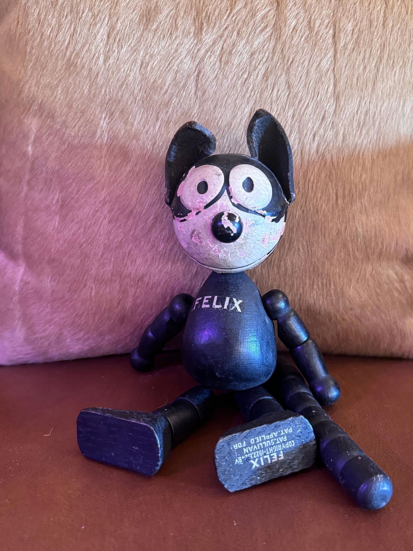 Antique Felix The Cat Wooden and Leather Toy: Vintage from before 2000 1920’s Felix The Cat Wooden and Leather ToyThis 1920s Felix the Cat toy is a collectible vintage toy featuring the iconic character Felix the Cat. These toys are highly