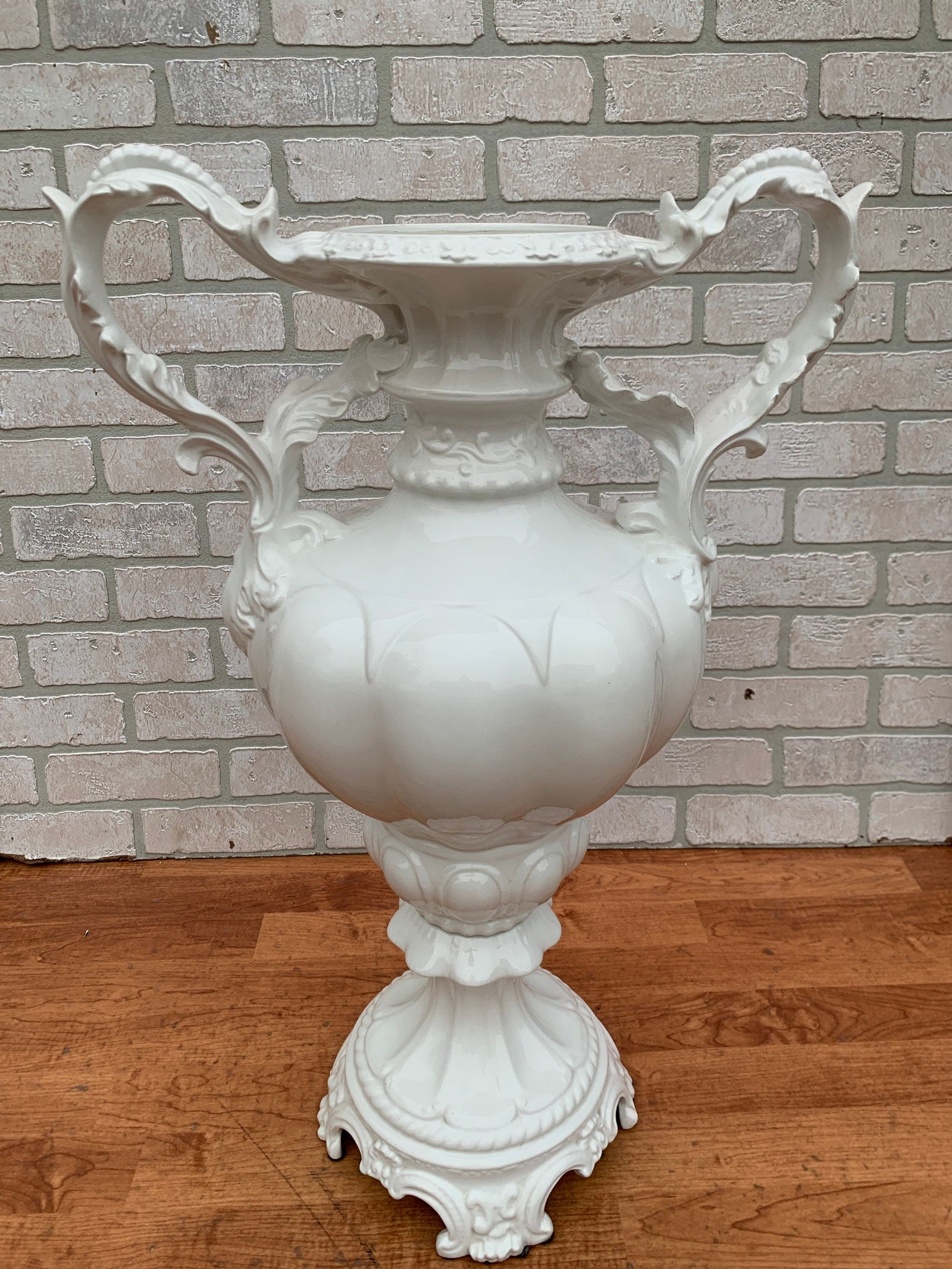 Italian Azzolin Brothers Capodimonte Vase with Handles: Vintage from the 1960s Materials: porcelain Vintage Italian Azzolin Brothers White Capodimonte Vase with Handles The vase has beautiful floral design! Circa 1960 H 28" W 18" D 12" CONCONDITION: Please