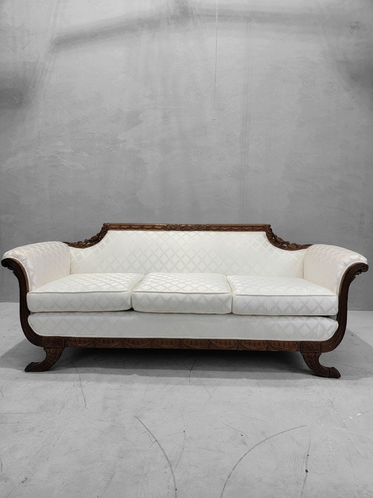 Antique Duncan Phyfe Carved Mahogany Parlor Sofa Upholstered in White Patterned Silk Blend: Vintage from before 2000 Materials: wood, upholstery, silk blend Overall width: 80 inches Overall height: 31.5 inches Overall depth: 35 inches Seat depth: 23.25 inches Antique Duncan Phyfe Finely Carv