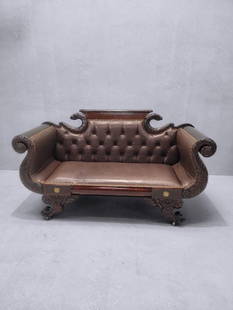 Antique Empire Style Carved Mahogany Tufted Back Parlor Sofa Newly Upholstered in Brown Leather: Vintage from before 2000 Antique Empire Style Carved Mahogany Tufted Back Parlor Sofa on Casters Newly Upholstered in Full Grain Espresso Italian LeatherThis antique Empire style carved mahogany sofa