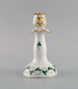 Herend candlestick in hand-painted porcelain with gold decoration. Mid 20th century.: Herend candlestick in hand-painted porcelain with gold decoration. Mid 20th century. Measures: 15 x 8.5 cm. In excellent condition. Stamped. Reserve: $168.00 Shipping: Domestic: Shipping rates are det
