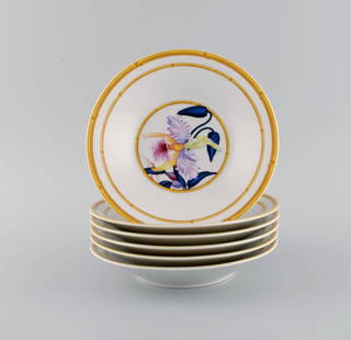 Porcelaine de Paris. "Aurore Tropicale". Six deep porcelain plates decorated with flowers and: Porcelaine de Paris. "Aurore Tropicale". Six deep porcelain plates decorated with flowers and bamboo. 1980s. Measures: 17 x 3 cm. In excellent condition. Stamped. Reserve: $189.00 Shipping: Domestic: