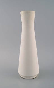 European studio ceramicist. Unique vase in white glazed ceramics. Clean design. 1980's.: European studio ceramicist. Unique vase in white glazed ceramics. Clean design. 1980's. Measures: 30.5 x 11 cm. In excellent condition. Stamped. Reserve: $329.00 Shipping: Domestic: Shipping rates are