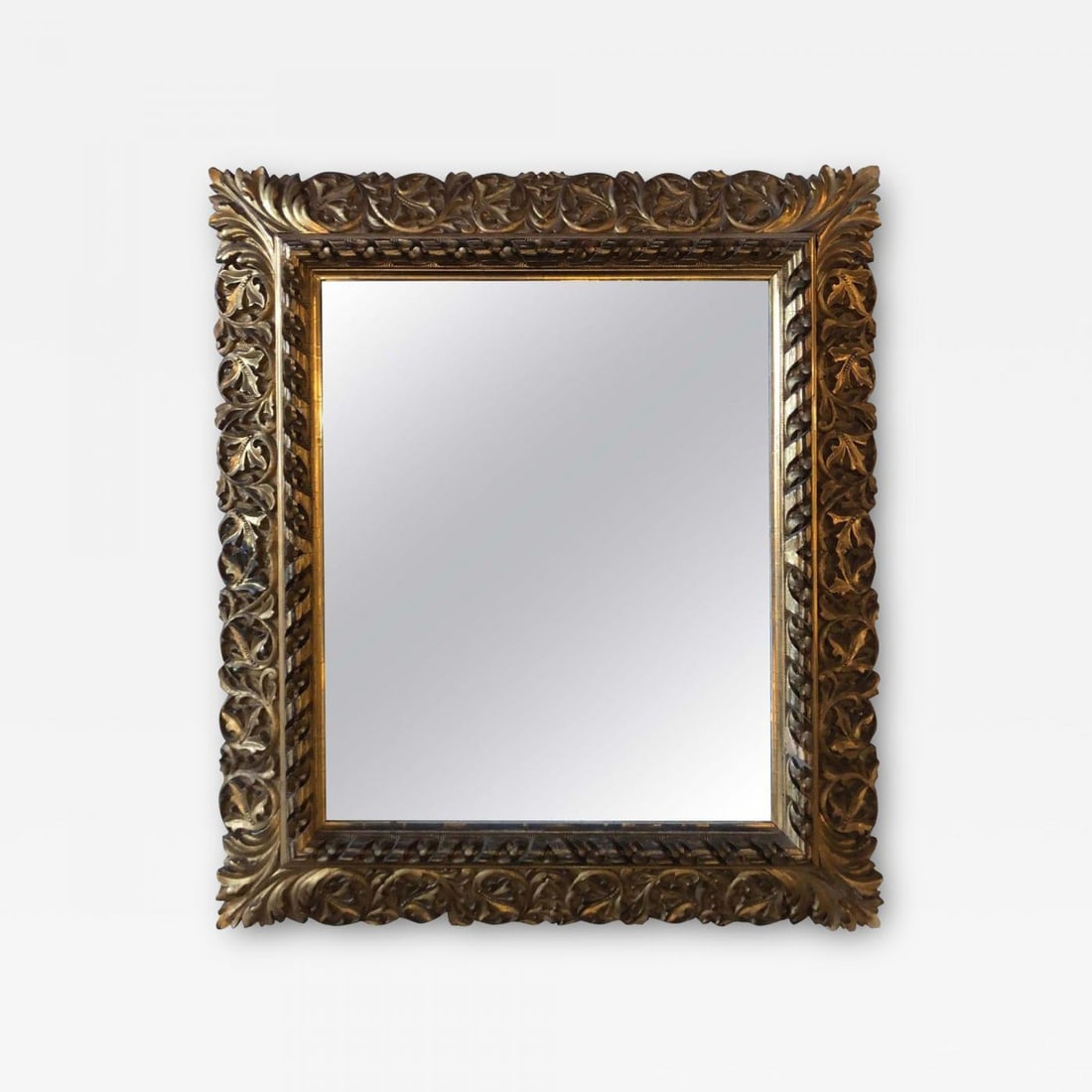 Antique 19th Century Fine Giltwood Mirror with Leaf Vine and Floral Carvings: Title: Antique 19th Century Fine Giltwood Mirror with Leaf Vine and Floral Carvings Description: Antique 19th century fine giltwood wall / console or pier mirror with leaf vine and floral carvings. Th