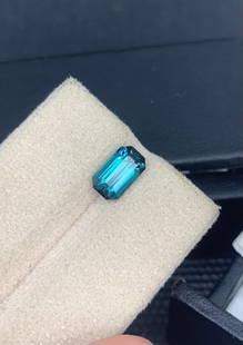 Blue Tourmaline Gem, Indicolite Blue Tourmaline Gemstone, Faceted Emerald Shape Stone, Natural: Materials: Gem type: Tourmaline Carat weight: 2 Weight : 1.810 Carat Dimension : 9*5.1*4.5 mm Shape : Emerald Cut Clarity : Loupe Clean Color : indicolite Blue Treatment : None Origin : Afghanistan Ha
