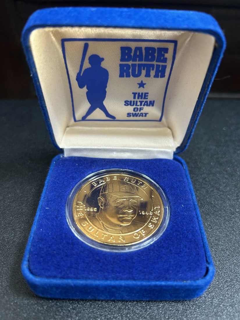 Babe Ruth Dollar - Gold Plated: Title: Babe Ruth Dollar - Gold Plated Description: Babe Ruth Dollar - Gold Plated Date/Period: 1994 Materials: Gold Plated Reserve: $20.00 Shipping: Domestic: Flat-rate of $7.95 to anywhere within t