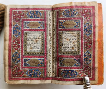 KORAN MANUSCRIPT 19th CENTURY antique QURAN book HAND WRITTEN: 19th century hand copied Qur'an. Written in Naskh script bordered in black and gold. Verses separated by gold florets, Surah headings written in red and black on gold background. Hand painted boards w
