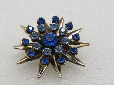 Vintage Shades of Blue Rhinestone Starburst Brooch, 1-5/8"