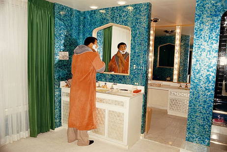 Muhammad Ali In Chicago ' By Terry Fincher Oversized C Type: Description ' Muhammad Ali in Chicago ' by Terry Fincher American boxer Muhammad Ali has a shave at his home in Chicago, 1977. Ali was WBA Heavyweight boxing champion at the time. (Photo by Terry Finc