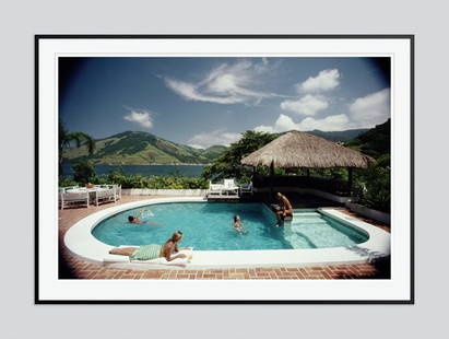 Slim Aarons 'Angra Dos Reis' 1988 Oversize Black Frame C Type Print: Description Slim Aarons 'Angra Dos Reis' 1988 Oversize Black Frame c type print A group of people by a swimming pool in Angra dos Reis, located in the south region of Rio de Janeiro state, Brazil, in