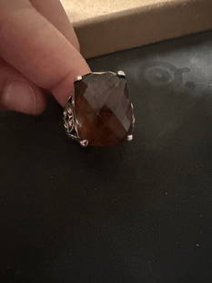 John Hardy Sterling Silver & 18k Gold Smoky Quartz Batu Kawung Ring Size 7.5: Title: John Hardy Sterling Silver & 18k Gold Smoky Quartz Batu Kawung Ring Size 7.5 Description:The John Hardy Sterling Silver & 18k Gold Smoky Quartz Batu Kawung Ring in size 7.5 is a luxurious piece