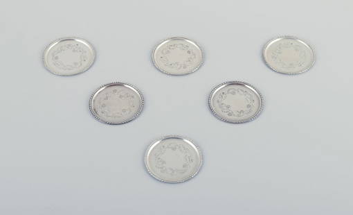 Georg Jensen, a set of six glass coasters in sterling silver.: Title:Georg Jensen, a set of six glass coasters in sterling silver. Description:Georg Jensen, a set of six glass coasters in sterling silver. Model number 51A. Stamped with the hallmark from 1915-1932