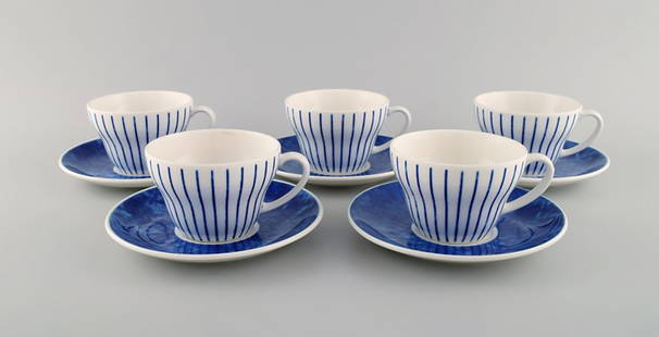 Jackie Lynd for Duka. Five Blues teacups with saucers in glazed ceramics with blue decoration.: Jackie Lynd for Duka. Five Blues teacups with saucers in glazed ceramics with blue decoration. Swedish design, early 21st