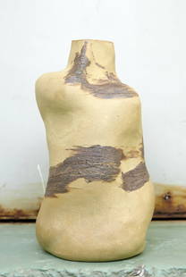 Christina Muff, Danish contemporary ceramicist (b. 1971). Bottleshaped sculptural vase in golden: Christina Muff, Danish contemporary ceramicist (b. 1971). Bottleshaped sculptural vase in golden stoneware clay with slip from Frederiksberg in Copenhagen. The vase is glazed inside with clear shiny g