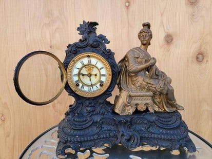 Antique "Commerce" Figural Mantel Clock by Ansonia Co.: Vintage from before 2000 Antique "Commerce" Figural Mantel Clock by Ansonia Co. This late 19th Century "Commerce" figural mantel clock by Ansonia Co. with 8-day time and strike has a spring-driven mov