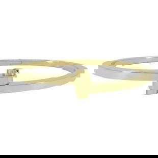 2005 Cartier Menotte 18k Gold Hinge Bracelet: About the Item This Cartier Menotte bracelet is crafted in 18k yellow gold, featuring a signature double screw motif at the front. Measuring 7 inches in inner circumference with a 1/2-inch width at it
