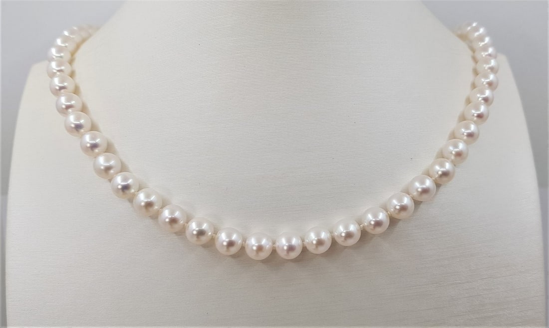 6.5x7mm Bright Akoya pearls - Necklace: Title: 6.5x7mm Bright Akoya pearls - Necklace Description: A pearl necklace of white saltwater Akoya pearls with lustre, finished with a solid silver ball clasp. The classic Akoya pearl is a type of c