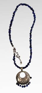 Vintage Lapis Lazuli Bead Necklace wih Sterling Silver Pendant: Vintage Lapis Lazuli Bead Necklace with Sterling Silver Pendant Stamped 925. Chain length: 45 cm. Weight 24.0 g Good pre-owned condition Reserve: $59.40 Shipping: Domestic: Flat-rate of
