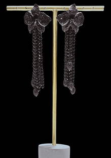 Black and White Flower Chandelier Earrings: Rhodium-Plated Sterling Silver (925) Crafted from premium 925 sterling silver and finished with a sleek rhodium plating for lasting shine and durability. Hand-Cut Zirconia (CZ) Features precision-cut