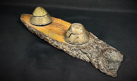 Antique WWI Inkwell with German Flare Shell Heads on Wooden Base: Title: Antique WWI Inkwell with German Flare Shell Heads on Wooden Base Origin:France Dimension: Height: 2.76 in (7 cm)Width: 16.15 in (41 cm)Depth: 5.52 in (14 cm) Materials:Wood Year:Early 20th Cent