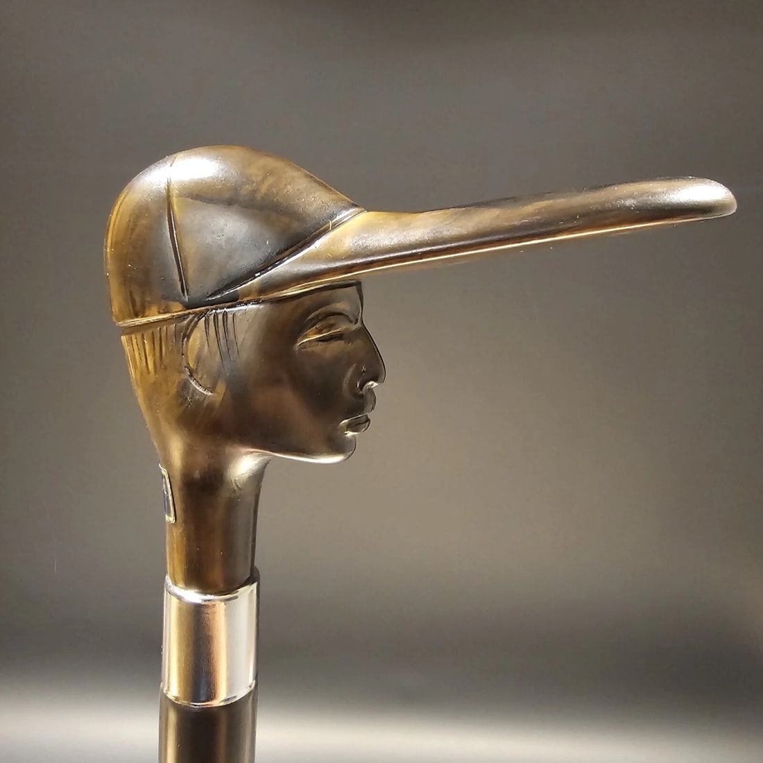 36" European Jockey Walking Stick Cane: 36" Long 3/4" shaft This reproduction European cane features a Jockey head handle. The jockey head handle with a simulated brown wood tone finish is made of high-impact durable nylon and mounted styli