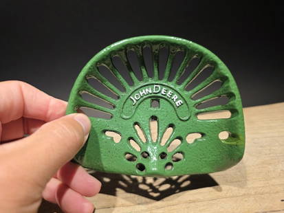5" Cast Iron John Deere Miniature Tractor Seat Sample: Nice Reproduction solid cast iron John Deere tractor seat. Certainly a great item! Be sure to see the images, for construction and manufacture details 100% Customer Satisfaction Guarantee We stand beh