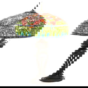33.25"H Tulip Stained Glass Table Lamp: 22 x 22 x 33.3 in This majestic reproduction stained glass lamp will bring delicate light into any room If you are looking for a statement piece, you've found it. This traditional Tiffany-style table