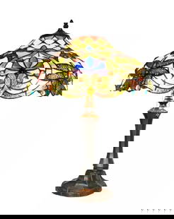 23" Stained Glass Amber Dragonfly Table Lamp: 23" High x 17" Wide Illuminate your space with the timeless beauty of our reproduction table lamp. This exquisite lamp features a hand-made stained glass shade Ideal for adorning bedside tables, foyer