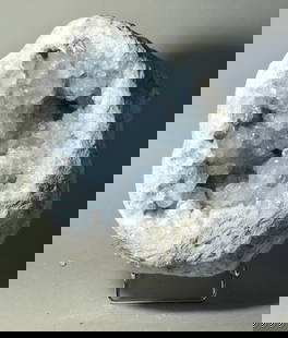 Superb Celestite geode: Title: Superb Celestite geode Origin: Madagascar Size: 21 ? 17 ? 11 cm Description: Mineral: Celestite Locality: Madagascar Measurements: 21 ? 17 ? 11 cm Weight: 6.8 kg Large celestite with gorgeous l