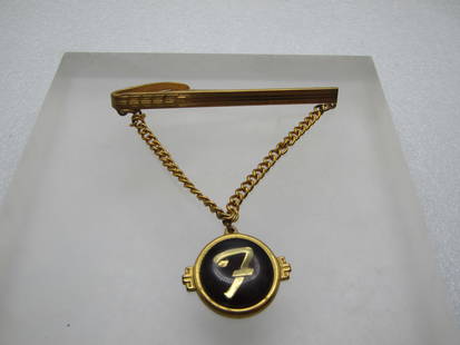 Vintage Initial F Tie Clasp, Chain Drop, 1930's-1940's: Vintage Initial F Tie Clasp, Chain Drop, 1930's-1940's. Art Deco design. Gold tone with a 3mm curb link chain that drops from the art deco designed bar that is appx. 2.5" wide. the drop is appx. 2.25"