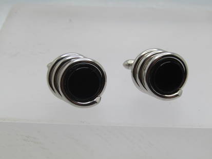 Vintage Black Glass Tiered Wrap Cufflinks, 1960's-1970's: Vintage Black Glass Tiered Wrap Cufflinks, 1960's-1970's. They are appx. 5/8" round on top - it is a black glass circular insert with a sivler tone wrap that has two more wraps under the stone and set