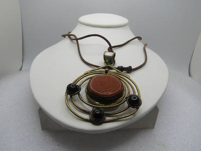Vintage Abstract Brass & Stone Brutalist Necklace, Brass & Silver Tone, 34", Adjustable ,: Vintage Abstract Brass & Stone Necklace, Brass & Silver Tone, 34", Adjustable. Brutalist. 1970's-1980's. The pendant has a wide swing bail with silver tone as the base on the bail and framed in brass