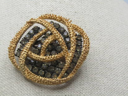 Vintage Tiered Rhinestone Brooch, Rhinestones, Mod/Abstract, 1960's: Vintage Tiered Rhinestone Brooch, Rhinestones, Mod/Abstract, 1960's. Black metal bottom level with clear 3.5mm rhienstoens set throughout. Sitting on top of that tiered are gold tone textured, bumpy c