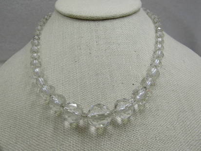 Vintage Crystal Faceted Beaded Necklace, 16", 1930's-1940's: Vintage Crystal Faceted Beaded Necklace, 16", Filigree Box Clasp, 1930's-1940's. The beads range from 5.5mm to 13mm. It is slightly over 16" long made of clear beads with smaller smooth glass spacer b