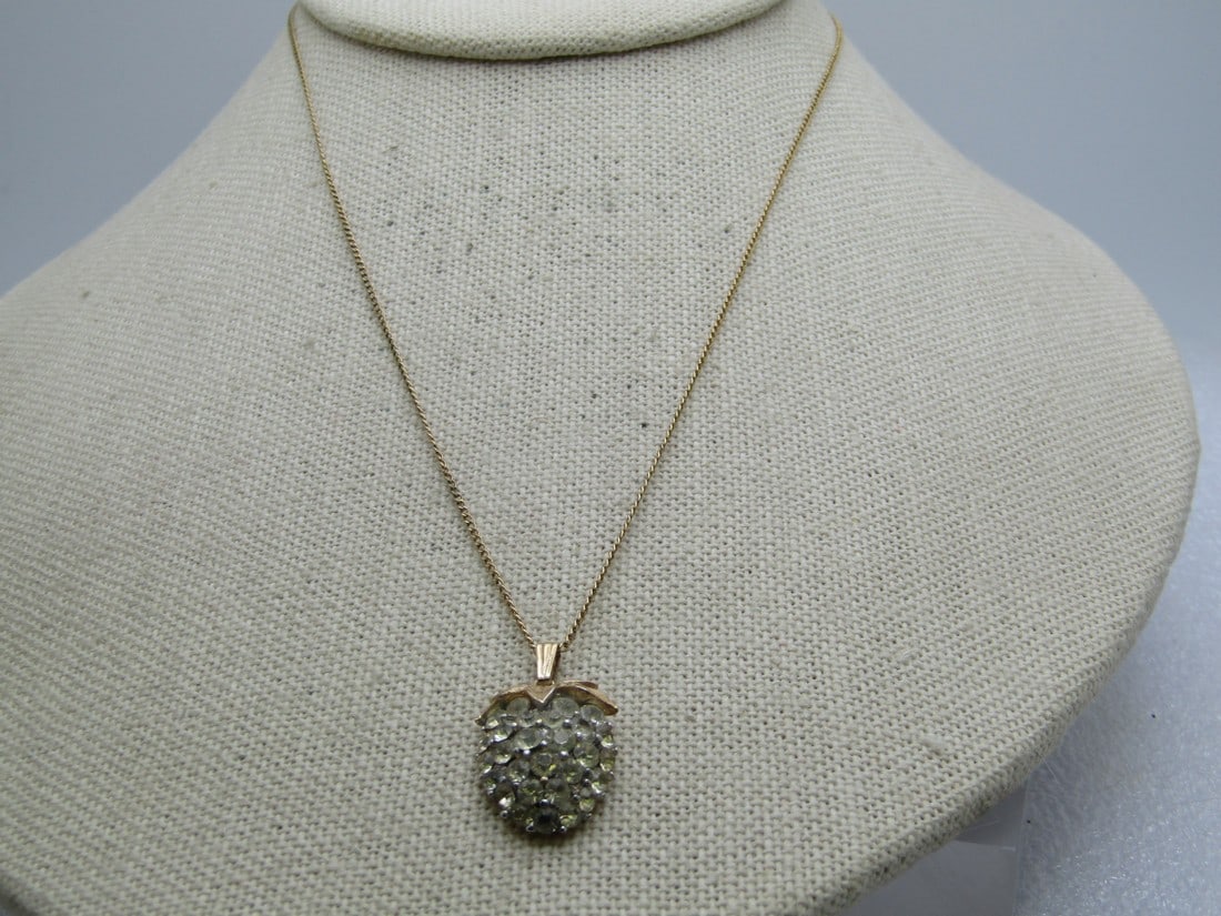 Vintage Trifari Strawberry Rhinestone Necklace, 16", 1960's: Vintage Trifari Strawberry Rhinestone Necklace, 16", 1960's. Cute gold tone strawberry with textrured cap and all rhinestone berry. It is appx. 7/8" long and 5/8" wide and domed. the chain is 16" 1mm
