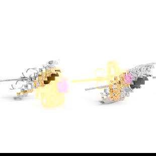 1.02 ctw Ruby 18K Gold Plated Designer Earrings: Title: 1.02 ctw Ruby 18K Gold Plated Designer Earrings Stone 1: Ruby Color: Red Shape: Oval Size: 5x4 Quantity: 2 CTW: 1.02 Plating Material: 18K Yellow Gold Primary Material: Base Metal Mount Type: E