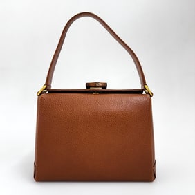 GUCCI Vintage Brown Leather Handbag with Bamboo Closure