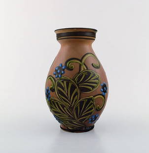 Kähler, HAK, glazed stoneware vase in modern design. 1930 / 40's.: K&#228;hler, HAK, glazed stoneware vase in modern design. 1930 / 40's. Cow horn technique. Flowers on brown background. Stamped. Measures: 20 x 14 cm. In perfect condition. Reserve:  $308.00 Shipping: