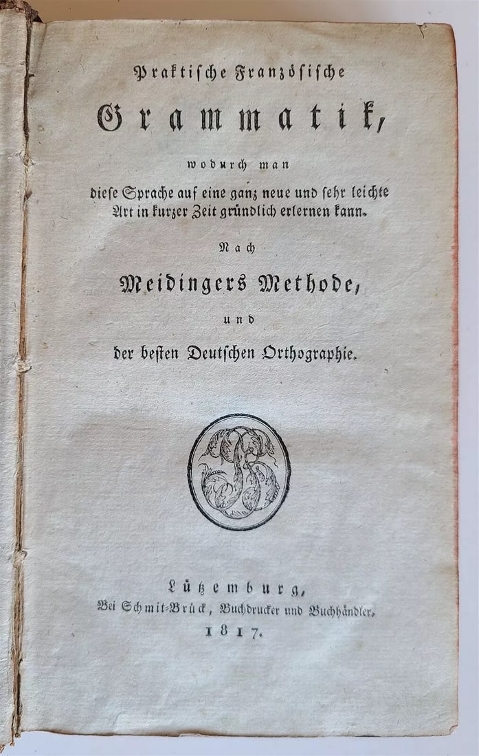 1817 FRENCH GRAMMAR in GERMAN antique Praktische Franzosische Grammatik: Praktische Franzosische Grammatik Lutzemburg ; 1817 Size 5 by 8" Half leather, red edges 623 pages Some wear of binding, good interior condition, some toning Text in German Reserve: $76.00 Shipping:</