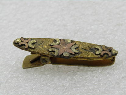 Edwardian Rose Gold Star Lingerie Clip Repousse, 1.5": Edwardian Rose Gold Repousse Star Lingerie Clip, 1.5" long and 3/8" on top, tapered. Brass base with rose gold star. Not signed. Good condition, cleaning would improve and brighten but great as is. (I