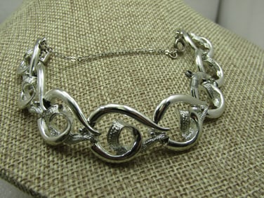Vintage Coro Silver tone Curved Link Bracelet, Safety Chain, 7", 1960's.