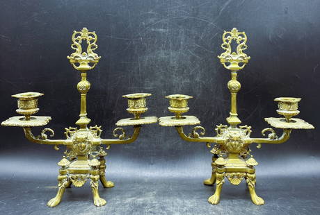 Exceptional Pair Brass Candlesticks Footed with Face detail: Title: Exceptional Pair Brass Candlesticks Footed with Face detail Date/Period: unknown Dimension: Approx. 9.5 tall x 8.5" wide x 3" deep Material: brass Additional Information: Exceptional Pair Brass