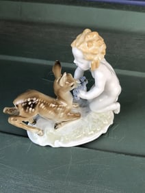 4 3/8” hutchenreuther boy w/ deer figure