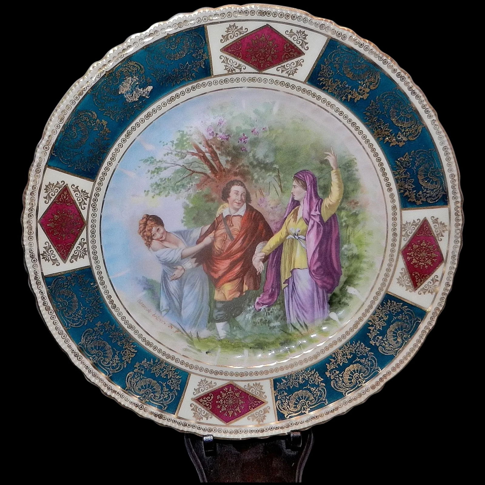 Antique Victoria Austria Signed Cabinet Plate circa early 1900’s: This Antique Victoria Austria Signed Cabinet Plate dates between 1904-1918 based upon backstamp. It measures 9 ¾” in diameter. Excellent condition! NO chips or flea bites color and gold are