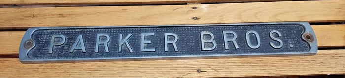 Parker brothers aluminum sign 1920 black