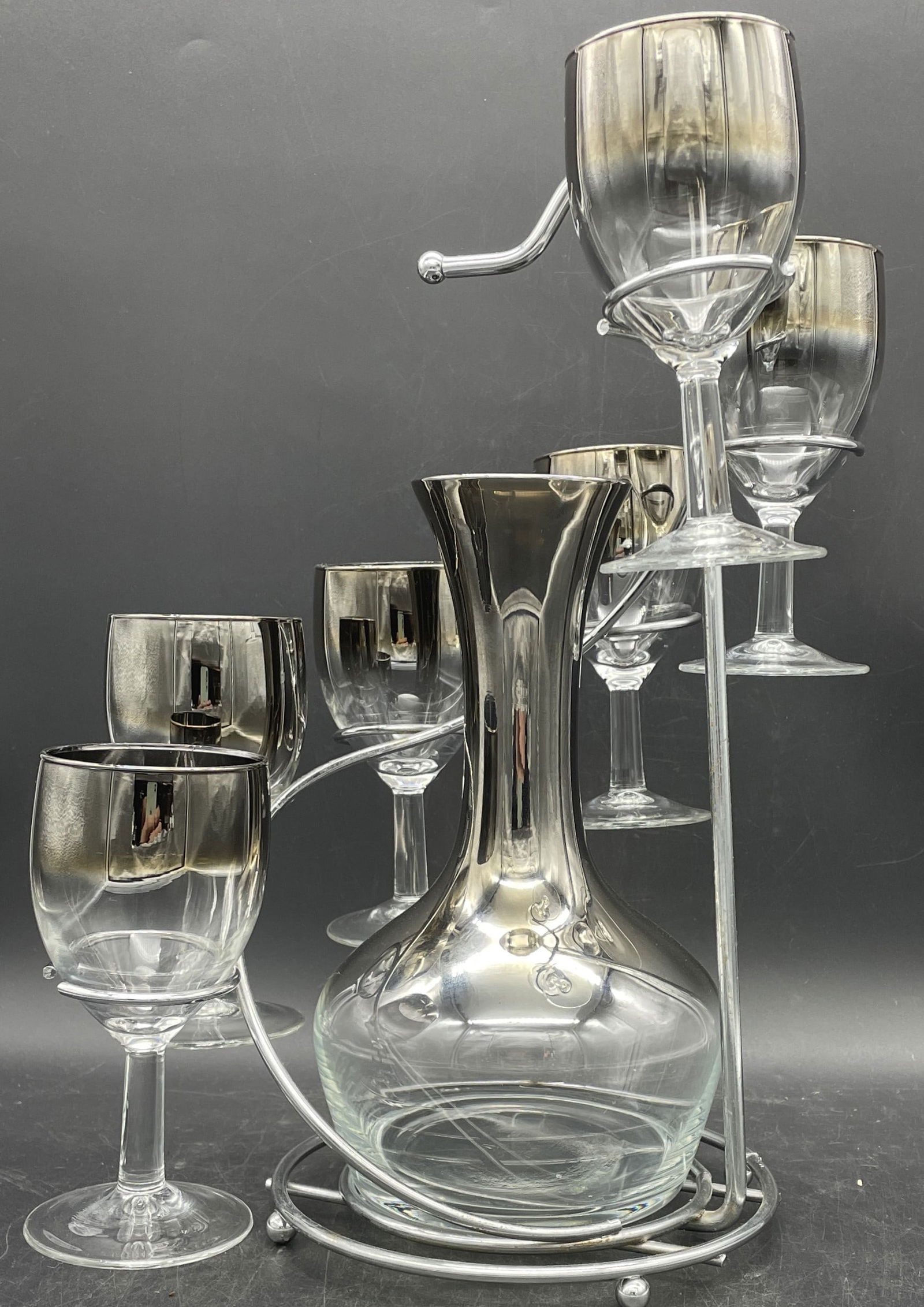 MCM Dorothy Thorpe Carafe & Glasses Caddy: Title: MCM Dorothy Thorpe Carafe & Glasses Caddy Date/Period: approx 1950's Dimension: STAND 12.5 TALL, CARAFE 8.25 TALL, GLASSES 5.25 TALL Material: mixed materials Additional Information: Mid Centur